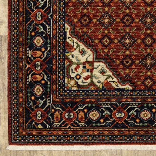 2' X 6' Red Blue Ivory And Orange Oriental Power Loom Stain Resistant Runner Rug With Fringe