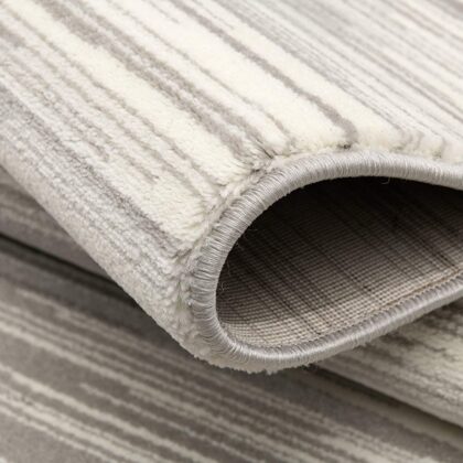 5' X 7' Black Abstract Dhurrie Area Rug