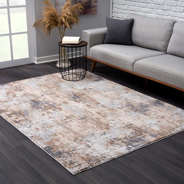 7’ X 10’ Beige And Ivory Abstract Area Rug