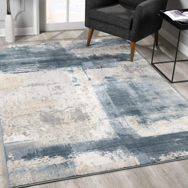 8’ X 11’ Cream And Blue Abstract Patches Area Rug