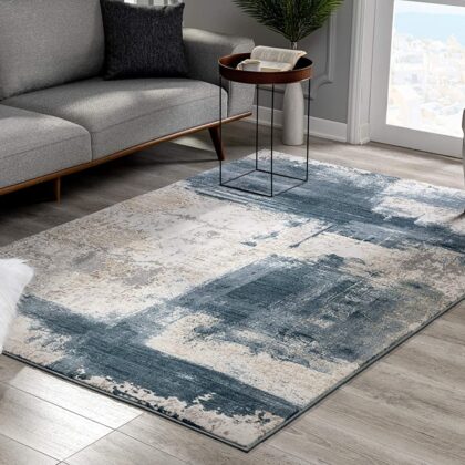 6' X 9' Blue And Ivory Abstract Dhurrie Area Rug