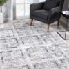 7’ X 10’ Gray And Ivory Abstract Distressed Area Rug