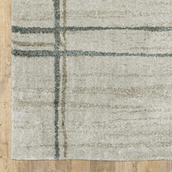 7' X 10' Grey Teal Beige And Tan Geometric Power Loom Area Rug