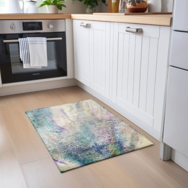 2' X 3' Beige Blue and Gray Abstract Washable Non Skid Indoor Outdoor Area Rug
