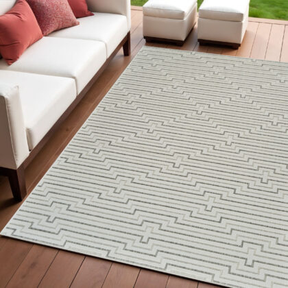 4' X 6' Cream and Beige Geometric Distressed Indoor Outdoor Area Rug