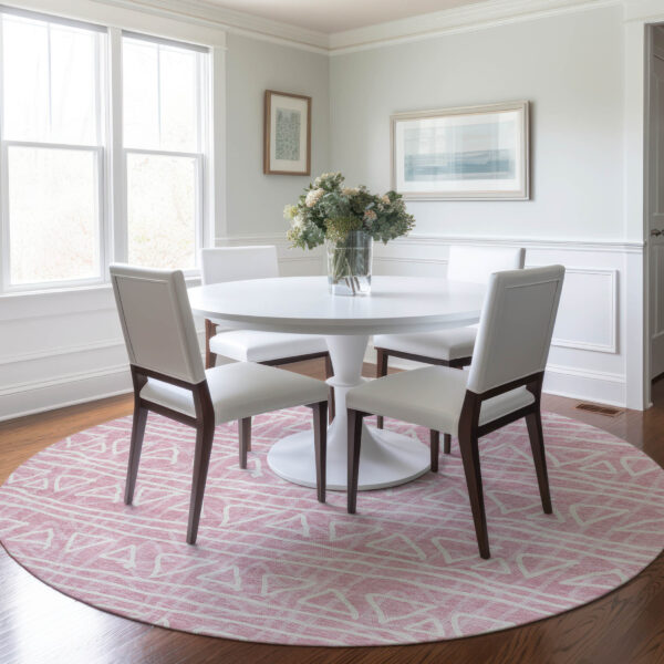 8' Pink And Ivory Round Geometric Washable Indoor Outdoor Area Rug