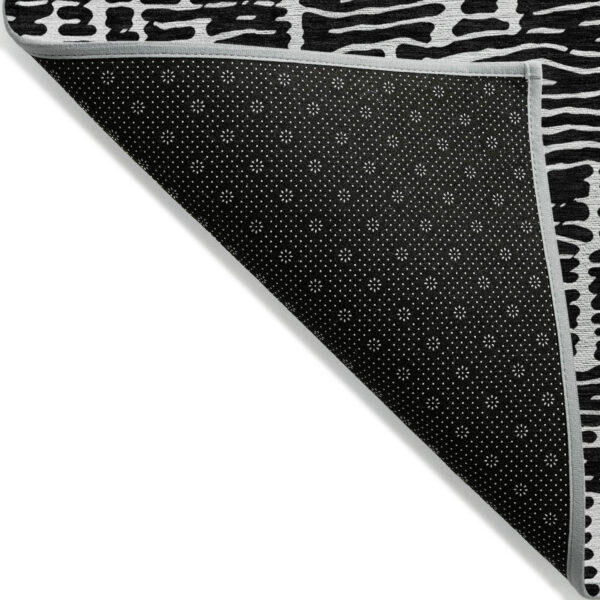 8' Black And Ivory Round Abstract Washable Indoor Outdoor Area Rug