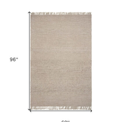 5' X 8' Natural Plain Wool Indoor Area Rug With Fringe