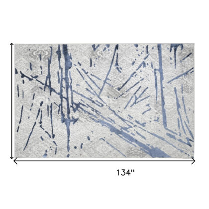 8' x 11' Ivory and Blue Abstract Area Rug