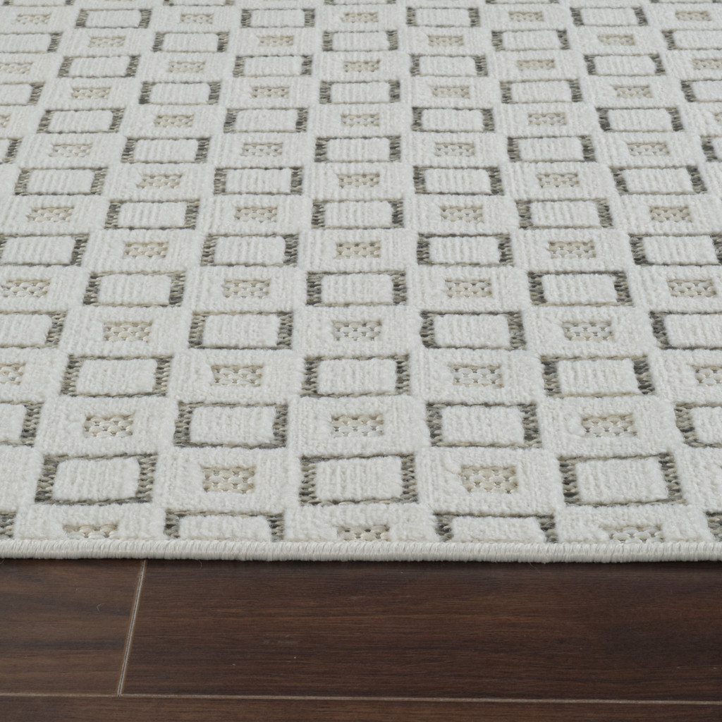8' X 10' Cream and Beige Geometric Distressed Indoor Outdoor Area Rug