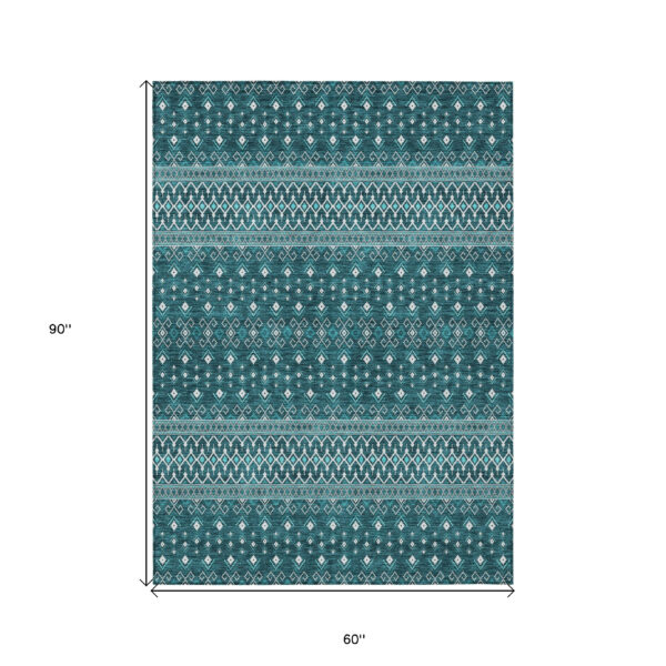 5' X 8' Teal Blue Aqua And Ivory Tribal Washable Indoor Outdoor Area Rug