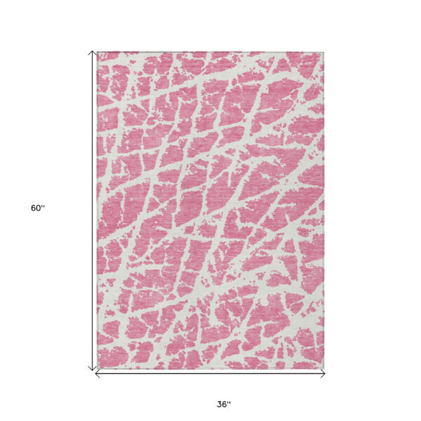 3' X 5' Pink and Ivory Abstract Washable Non Skid Indoor Outdoor Area Rug
