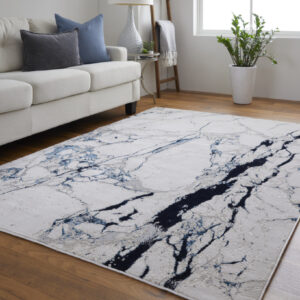 5' x 8' Ivory and Blue Marble Power Loom Distressed Area Rug