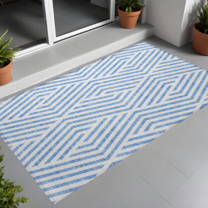 3' X 5' Blue and Ivory Geometric Washable Non Skid Indoor Outdoor Area Rug