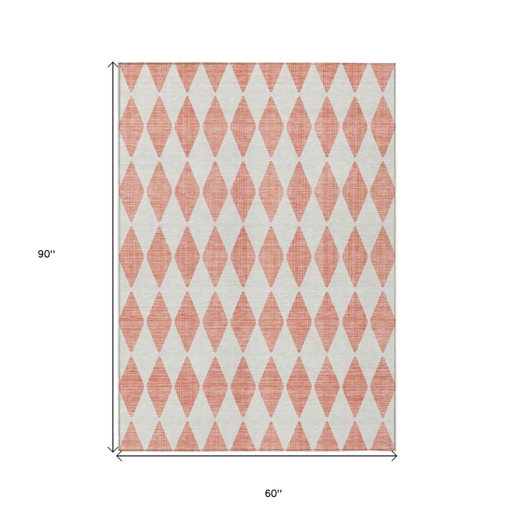 5' X 8' Salmon And Ivory Geometric Washable Indoor Outdoor Area Rug