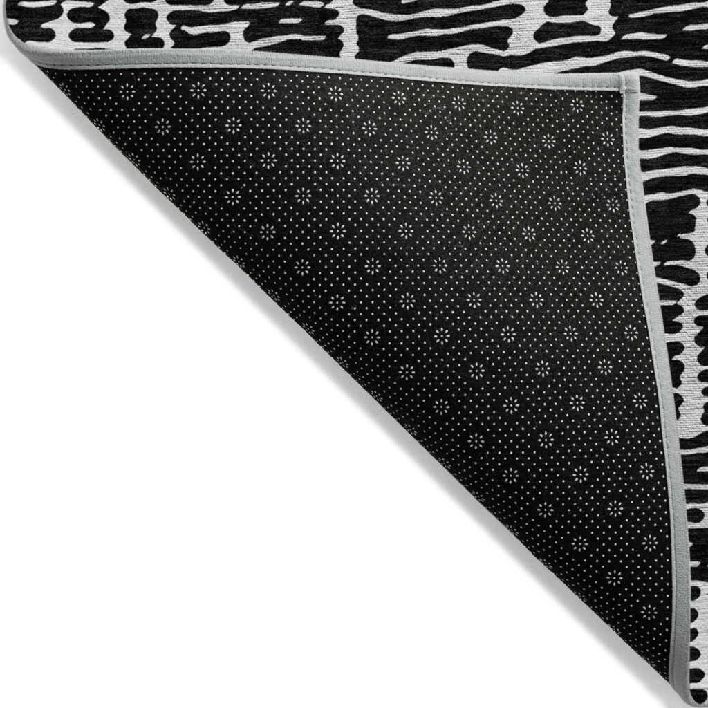 5' X 8' Black And Ivory Abstract Washable Indoor Outdoor Area Rug