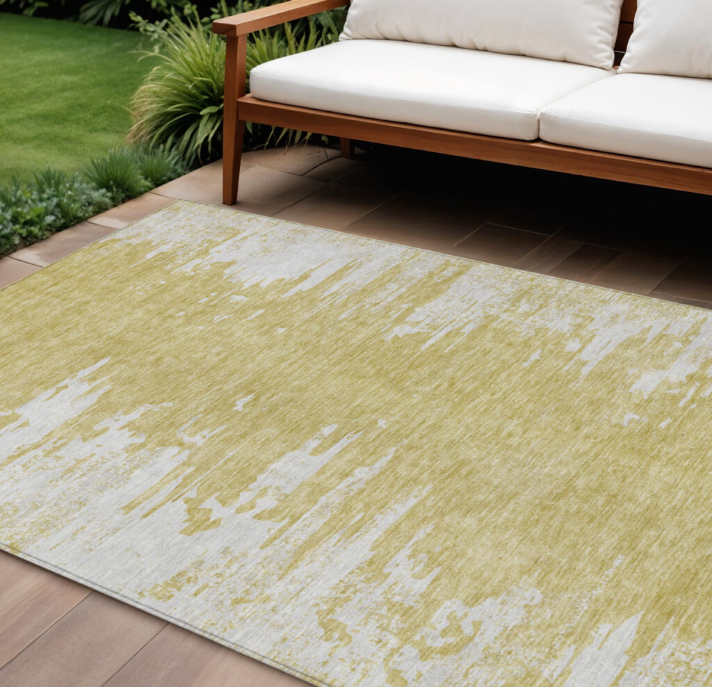 9' X 12' Gold And Ivory Abstract Washable Indoor Outdoor Area Rug