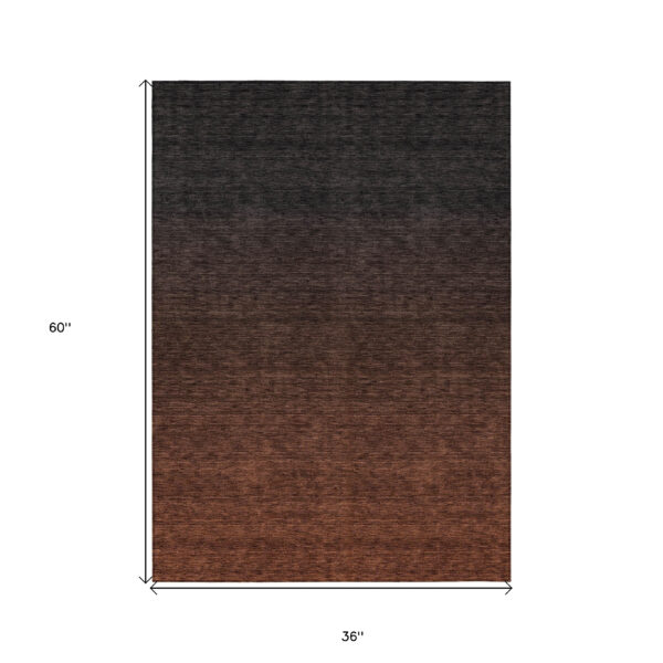 3' X 5' Orange And Charcoal Abstract Washable Indoor Outdoor Area Rug