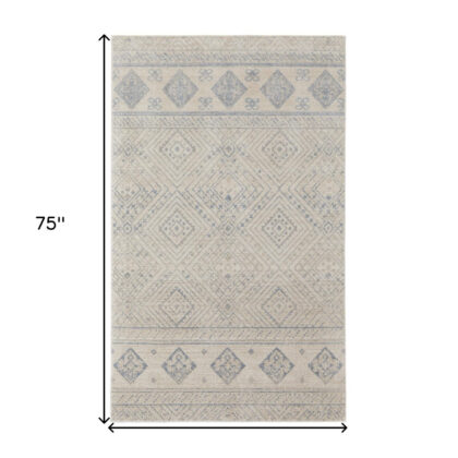 4' X 6' Ivory And Blue Geometric Power Loom Distressed Area Rug