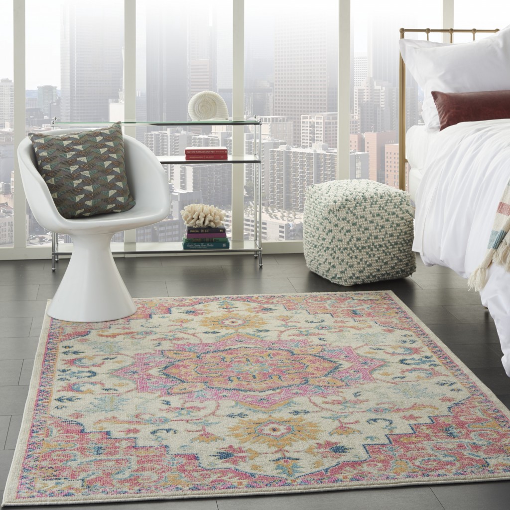 5' X 7' Pink And Ivory Southwestern Dhurrie Area Rug