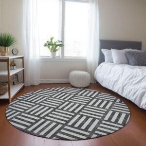 8' Black And Ivory Round Geometric Washable Indoor Outdoor Area Rug