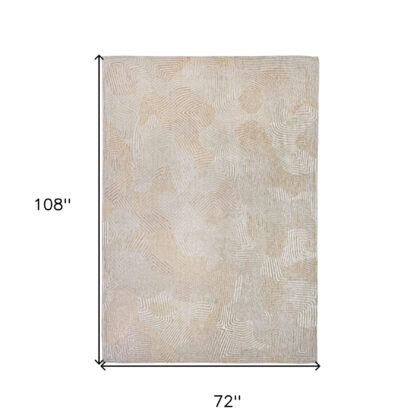 7' x 9' Beige and White Abstract Non Skid Area Rug