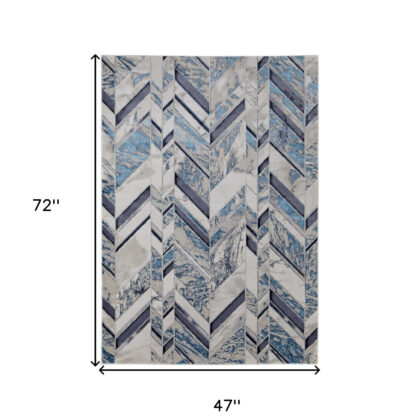 4' x 6' Ivory and Blue Chevron Power Loom Distressed Area Rug