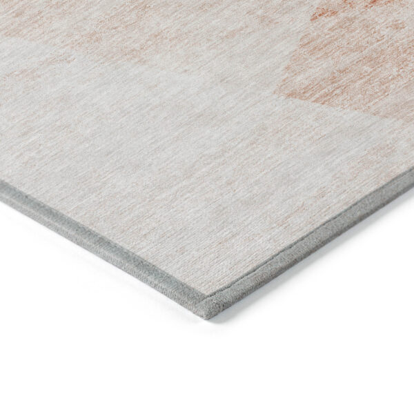 9' X 12' Salmon Peach And Ivory Abstract Washable Indoor Outdoor Area Rug