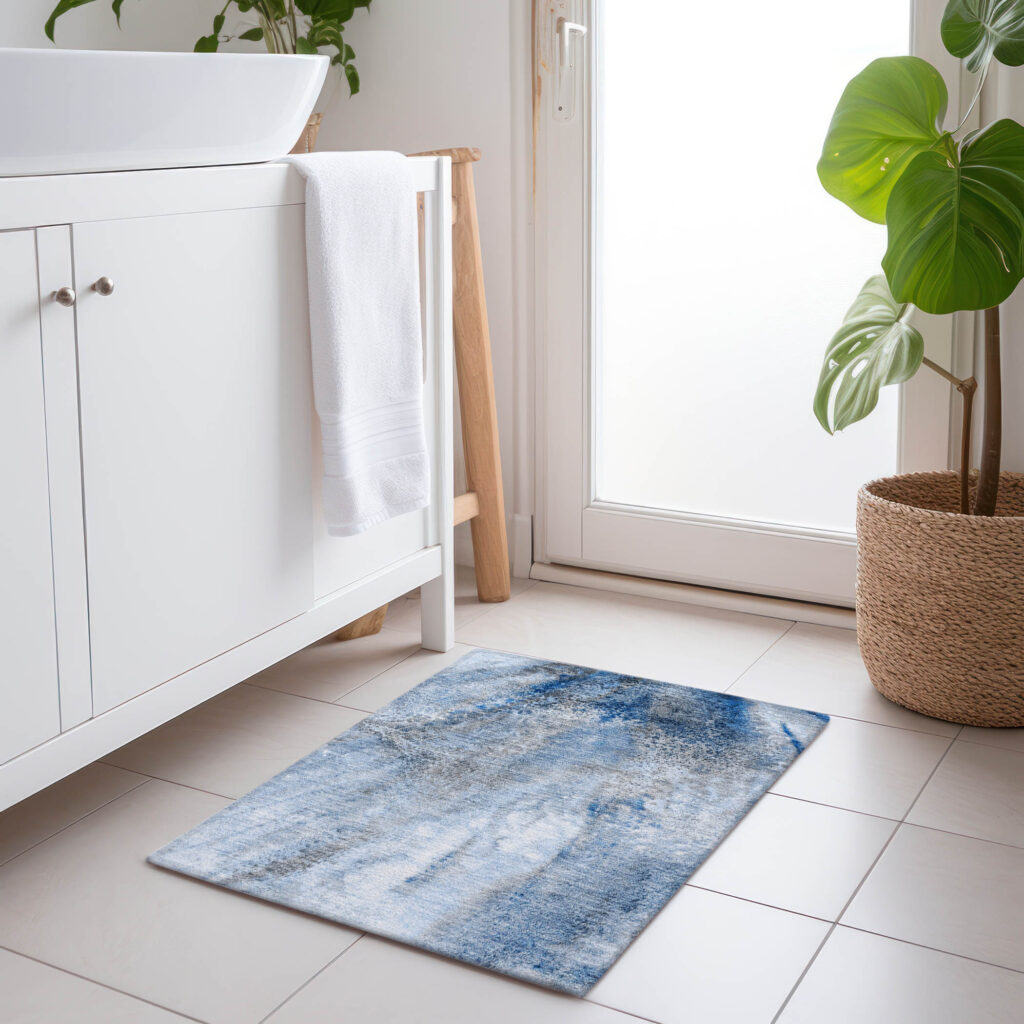 2' X 3' Ivory Blue and Gray Abstract Washable Non Skid Indoor Outdoor Area Rug