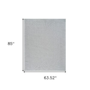 5' X 7' Cream and Beige Striped Distressed Indoor Outdoor Area Rug