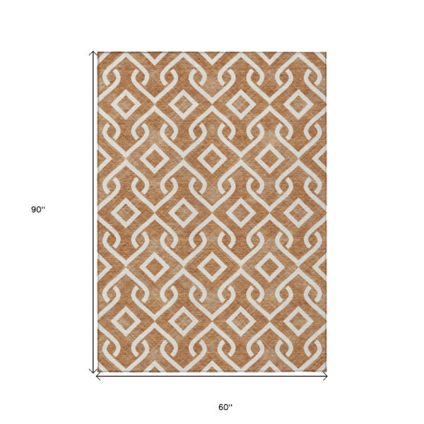 5' X 8' Orange And Ivory Geometric Washable Indoor Outdoor Area Rug