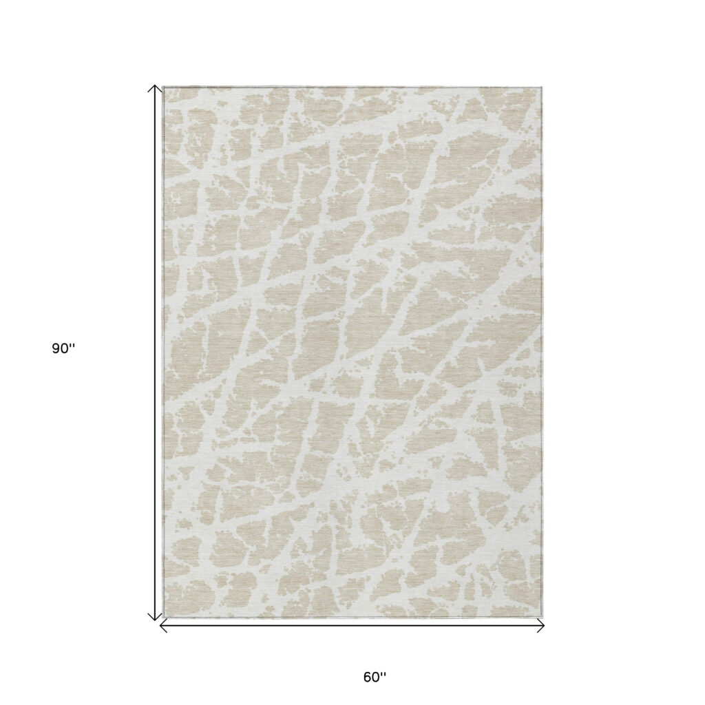 5' X 8' Beige and Ivory Abstract Washable Non Skid Indoor Outdoor Area Rug