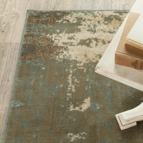 5' X 7' Teal Blue Brown Green And Beige Abstract Power Loom Stain Resistant Area Rug