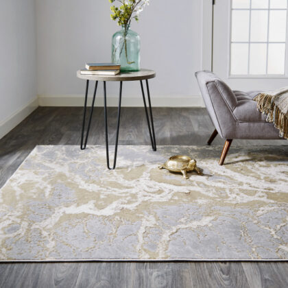 9' X 12' Ivory Silver And Gold Abstract Area Rug