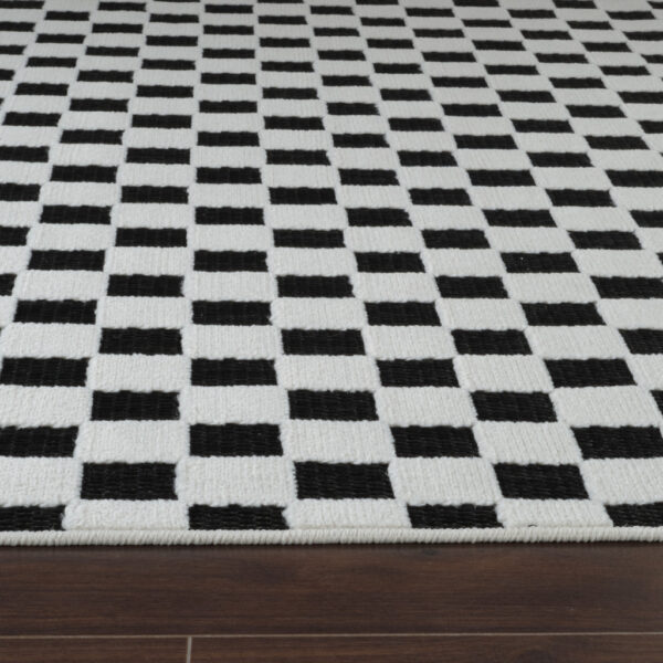5' X 7' Black and White Geometric Distressed Indoor Outdoor Area Rug