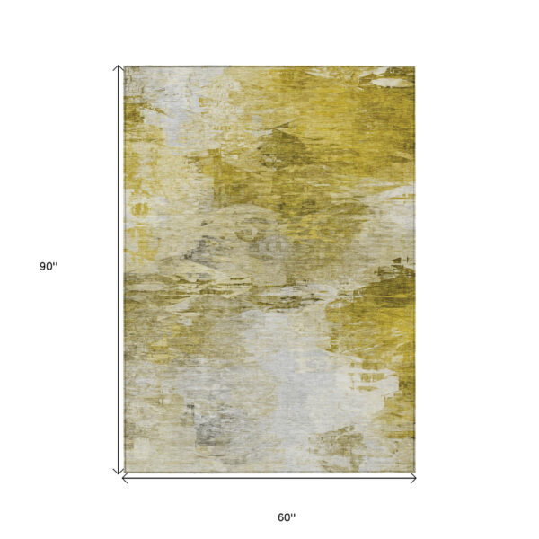 5' X 8' Gold Beige And Wheat Abstract Washable Indoor Outdoor Area Rug