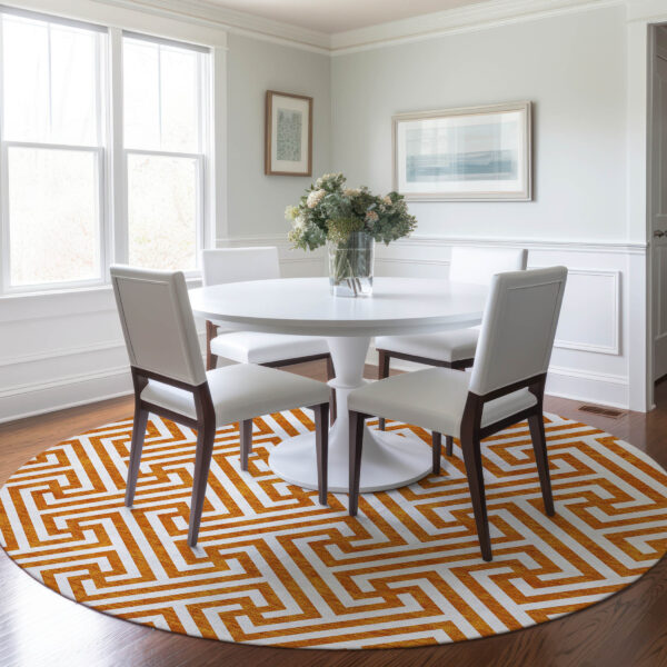 8' Orange And Ivory Round Geometric Washable Indoor Outdoor Area Rug