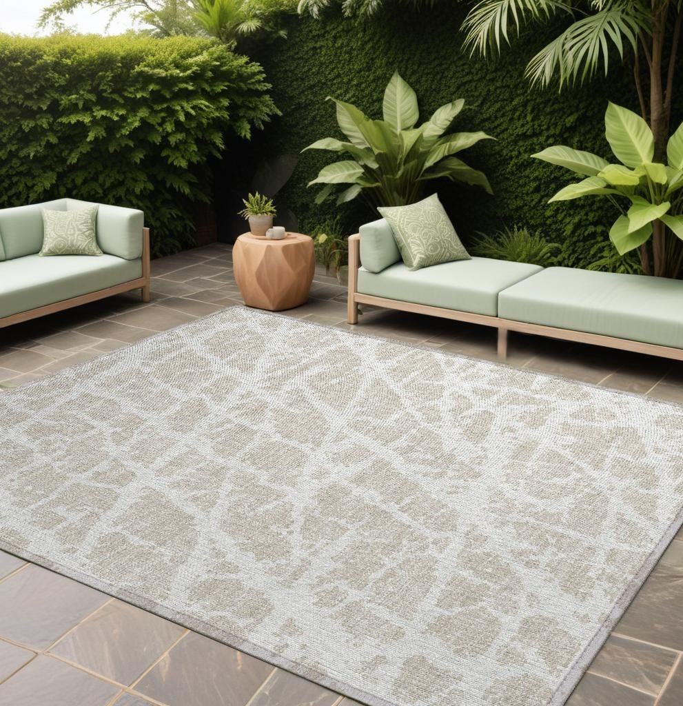 8' X 10' Beige and Ivory Abstract Washable Non Skid Indoor Outdoor Area Rug