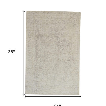 2' X 3' Ivory And Tan Abstract Hand Woven Area Rug