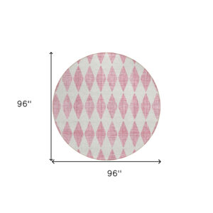 8' Pink And Ivory Round Geometric Washable Indoor Outdoor Area Rug
