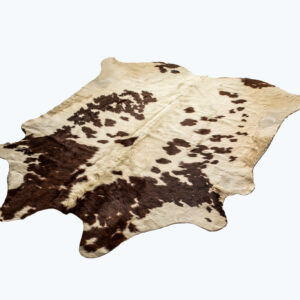 5' x 7' Brown and White Cowhide Hand Knotted Area Rug