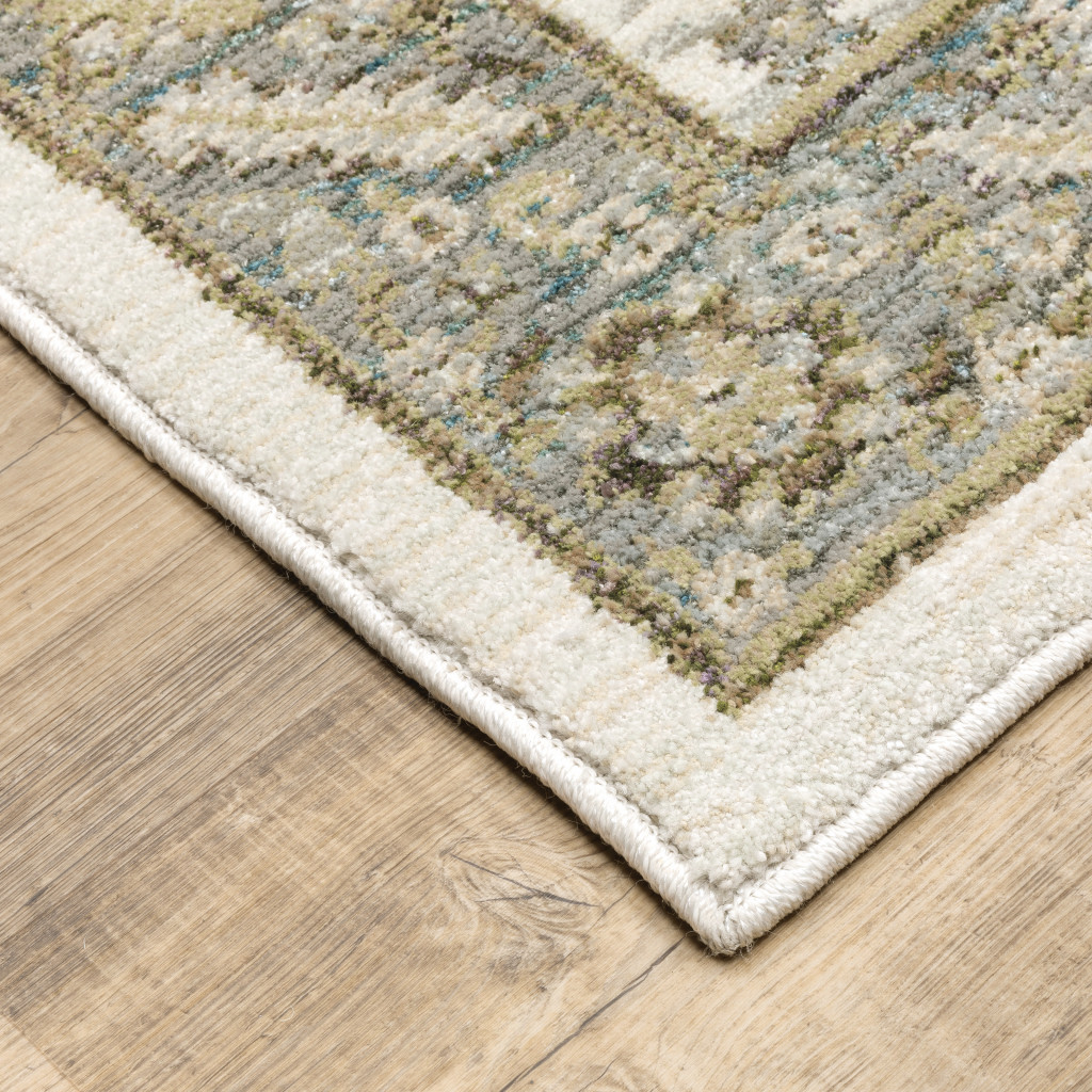 6' X 9' Stone Grey Ivory Green Brown Teal And Light Blue Oriental Power Loom Stain Resistant Area Rug