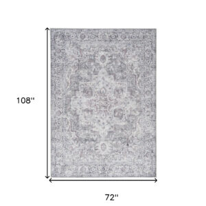 6' X 9' Blue And Pink Floral Power Loom Distressed Washable Area Rug