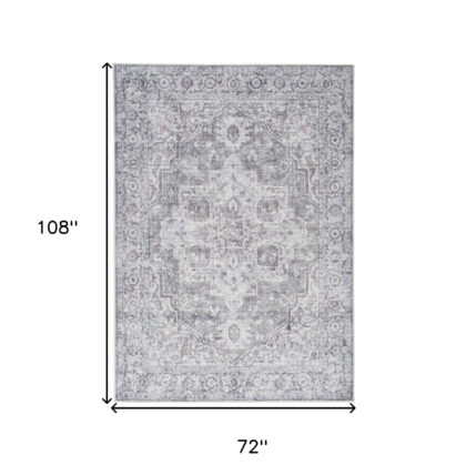 6' X 9' Blue And Pink Floral Power Loom Distressed Washable Area Rug