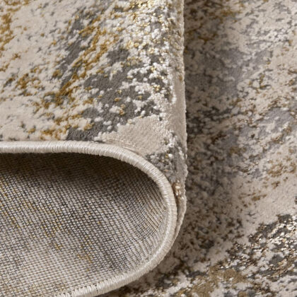 5' X 8' Gold Gray And Ivory Abstract Stain Resistant Area Rug