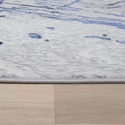 8' x 11' Ivory and Blue Abstract Area Rug