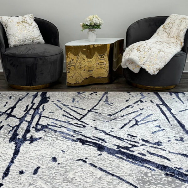 8' x 11' Ivory and Blue Abstract Area Rug