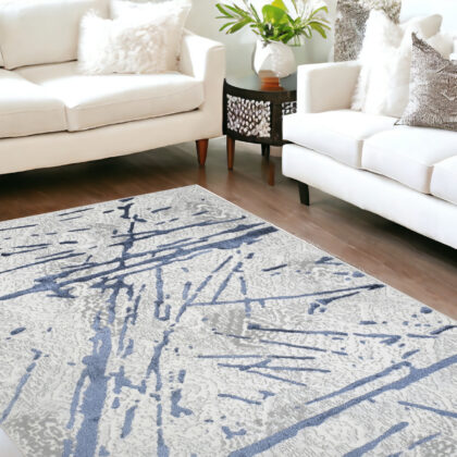 8' x 11' Ivory and Blue Abstract Area Rug