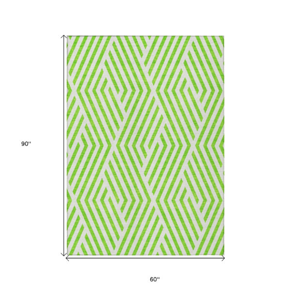 5' X 8' Lime Green and White Geometric Washable Non Skid Indoor Outdoor Area Rug