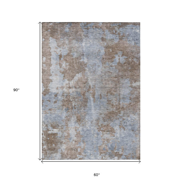 5' X 8' Mocha and Blue Abstract Washable Non Skid Indoor Outdoor Area Rug
